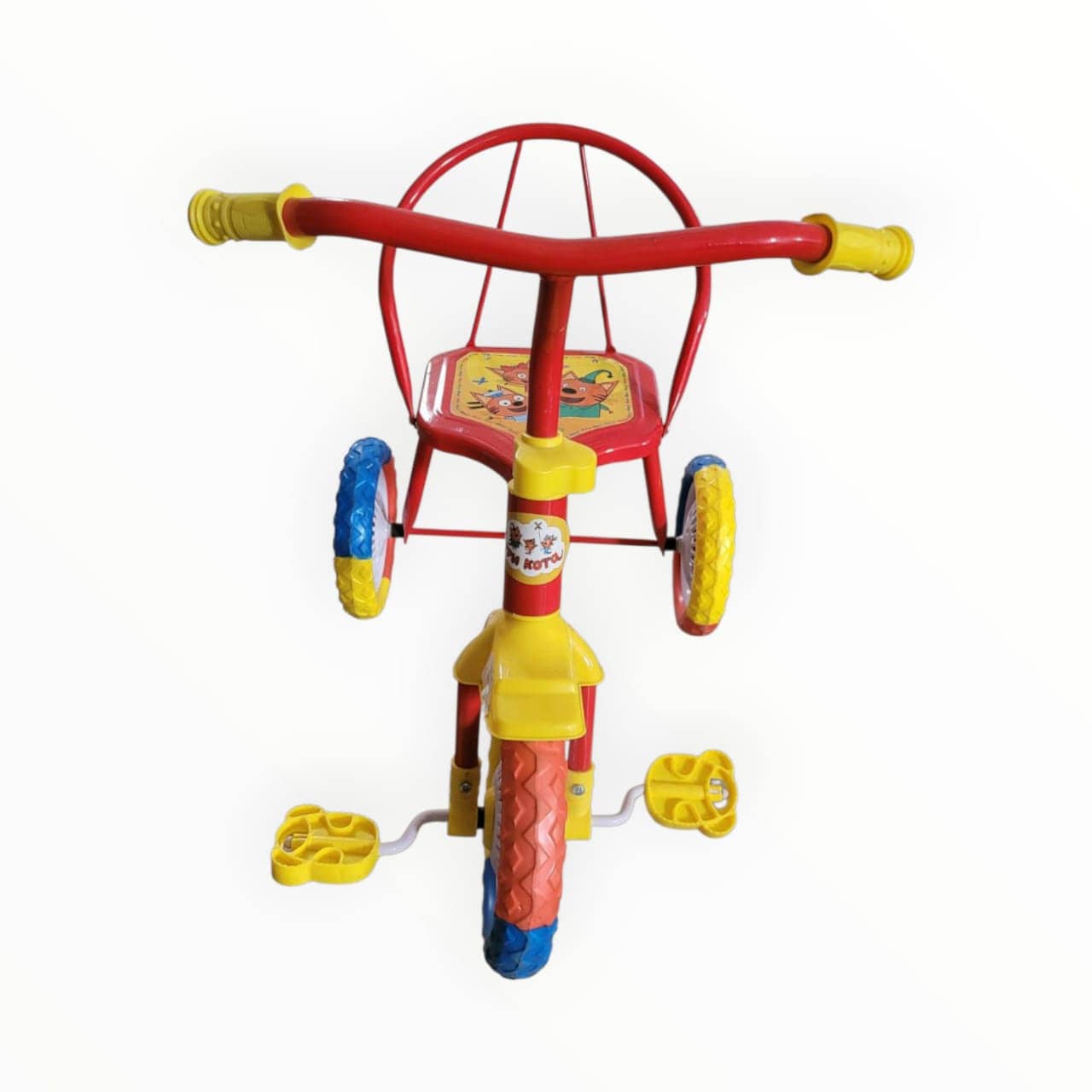 Colorful children's tricycle on a white background