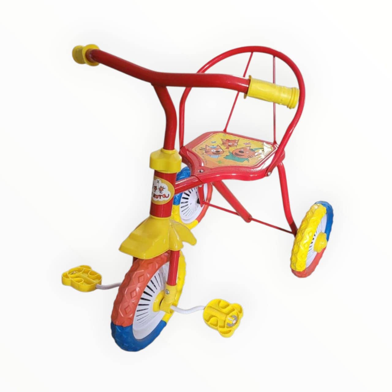 Colorful children's tricycle on a white background