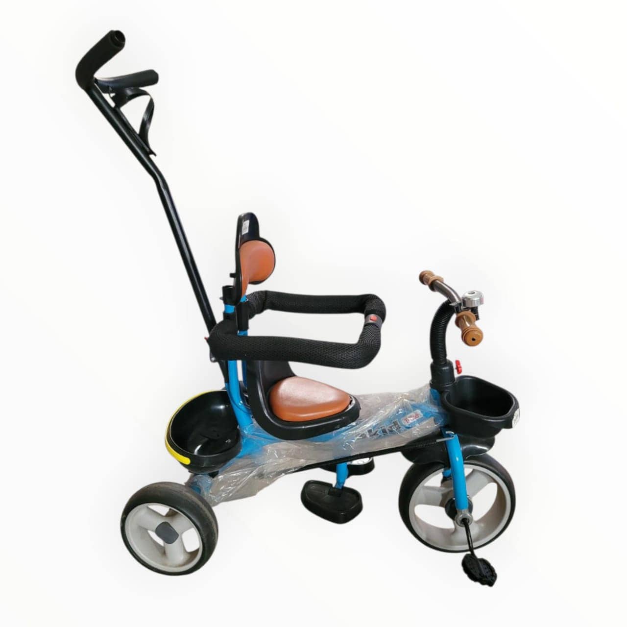 Children's tricycle with a seat and handlebar on a white background