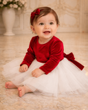 Smilingbabygirlinfestivedress