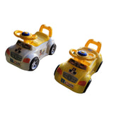 Two toy police cars on a concrete surface