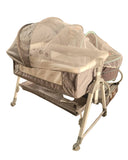 Baby bassinet on display in a store with toys in the background