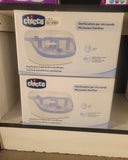 Two Chicco microwave sterilizers on a shelf