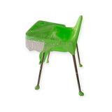 Green plastic chair with a transparent seat on a white background