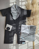 Black baby romper with checkered burp cloth, bib & pacifier